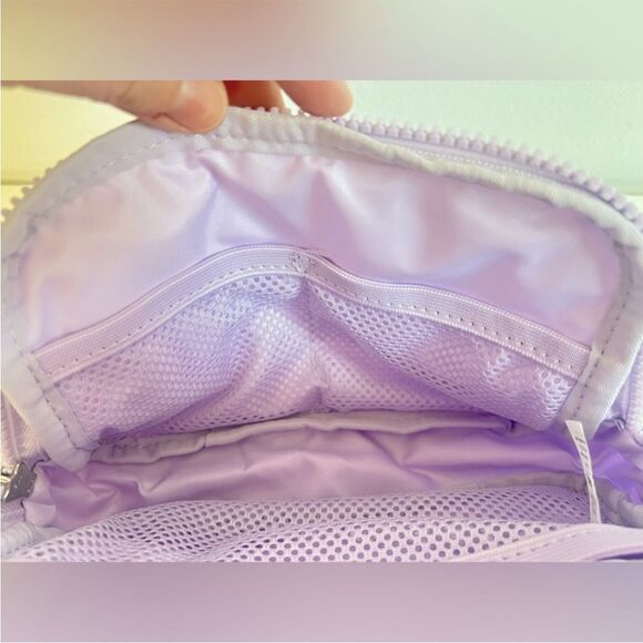 NWOT Lululemon Everywhere Belt Bag 1L
Wordmark- Lilac Ether/White Opal/White - Picture 7 of 16